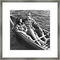 Couple Canoeing Framed Print