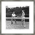 Couple Playing Tennis Framed Print