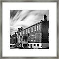 Courthouse With Streaming Clouds Framed Print