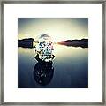 Crystal Skull Laying On Rock In Lake Framed Print