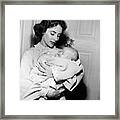 Elizabeth Taylor Holds Baby For Movie Framed Print
