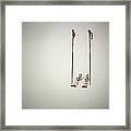 Empty Skis And Poles In Snow Framed Print