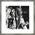 Evacuees Waiting For A Train Framed Print