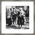 Families Carrying Food Framed Print