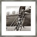 Family Walking Down Airplane Stairs Framed Print