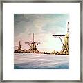 Four Windmills Ona Waterway Framed Print