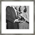 Frank Sinatra And Donna Reed Holding Framed Print