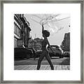 Girl Going Down The Street With Balloons Framed Print