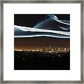 Glowing Vapor Hovering Over Cityscape Framed Print