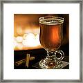 Hot Apple Cider By A Fireplace Framed Print
