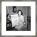 Jacqueline Kennedy Holding Newspaper Framed Print