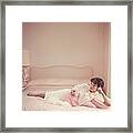 Joan Collins Relaxes Framed Print