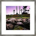 Long Rocky Beach With Lighthouse Framed Print