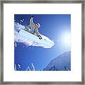 Low Angle Mid Air Shot Of A Woman Framed Print