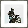 Low Angle View Of A Motocross Rider Framed Print