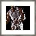 Mixed Race Basketball Player Bouncing Framed Print