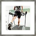 Mixed Race Man Running On Treadmill Framed Print