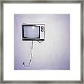 Obsolete Tv Hanging On A Motel Wall Framed Print