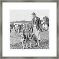 Owners With Their Prize Dogs At Dog Show Framed Print