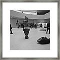 Photographer Lying On Floor And Taking Framed Print