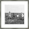 Photographers On Ground Taking Pictures Framed Print