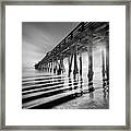 Pier And Shadows Framed Print