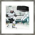 Puck Shot By Ice Hockey Player Framed Print
