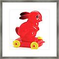 Red Rabbit Toy On Wheels Framed Print