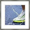 Running Shoe Splashing Water On Track Framed Print