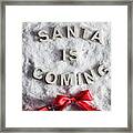 Santa Is Coming Writing And A Red Bow Framed Print