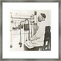 Scientist Observing Recording Instrument Framed Print