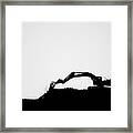 Silhouette Of A Bulldozer Digging In Framed Print