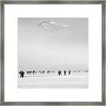 Skating Under The Mountain Framed Print