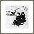 Sledging Nuns Framed Print