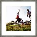Soccer Players Tackling For Ball Framed Print