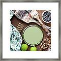 Still Life Of Paint Brushes, Limes And Textiles Framed Print