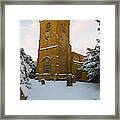 Stone Church In The Snow At Sunset Framed Print