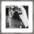 The Dalmatian Dog Kissing Its Owner Framed Print