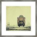 Train With Buildings And Fog On Framed Print