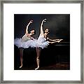 Two Ballet Dancers Stretching Framed Print