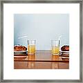 Two Cinnamon Buns And Two Glasses Of Framed Print