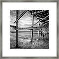 Uner The Pier In Black And White Framed Print