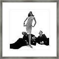 Veruschka With Three Actors At Her Feet Framed Print
