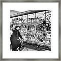 West Berlin Woman Rides Bicycle Past Framed Print