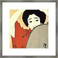 Woman Adjusting Her Hair In Front Framed Print