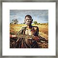 Woman From Mursi Tribe Framed Print