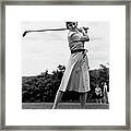 Woman Golfing Framed Print