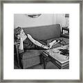 Woman Lounging On Sofa Framed Print