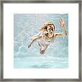Woman Swimming Underwater Framed Print