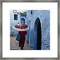 Woman With Blue Bag Framed Print